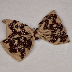 Hand beaded bow chevron pattern
